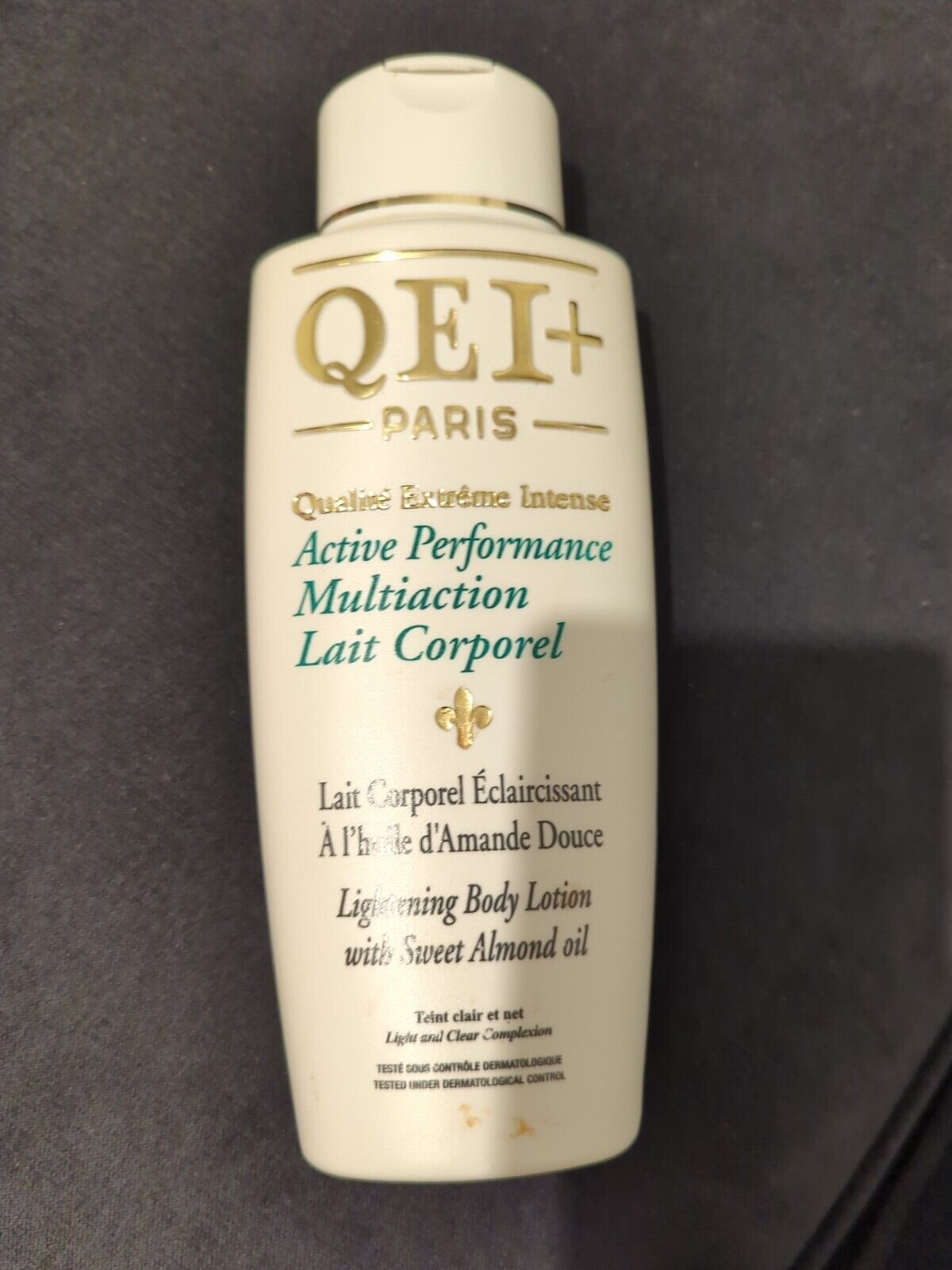 QEI+ Paris Active Performance Multi-Action Moisturising Toning Body Milk -500 ml/16.91 fl .oz.